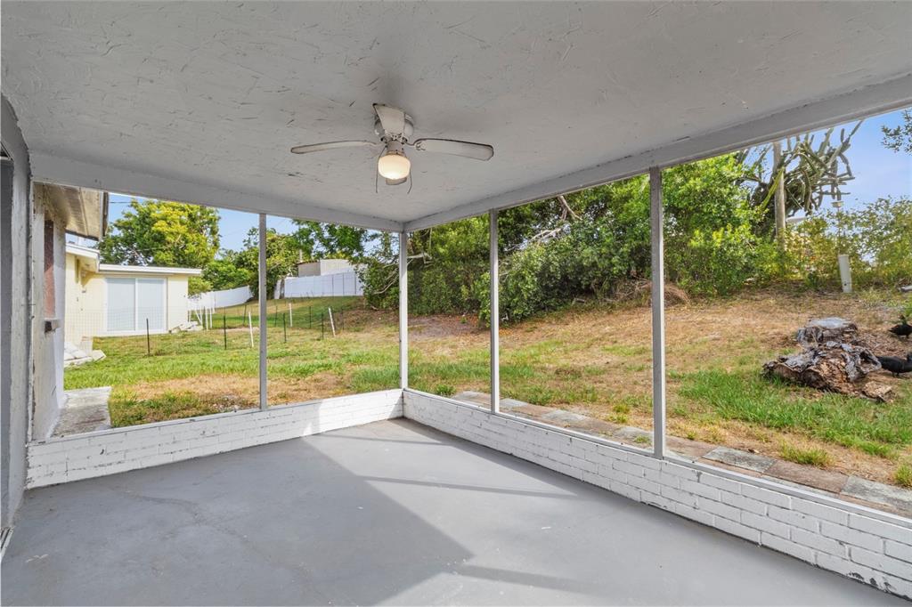 1623 Plum Tree Road Holiday, FL 34690 - Photo 18 of 33 a view of a room with window and an outdoor view