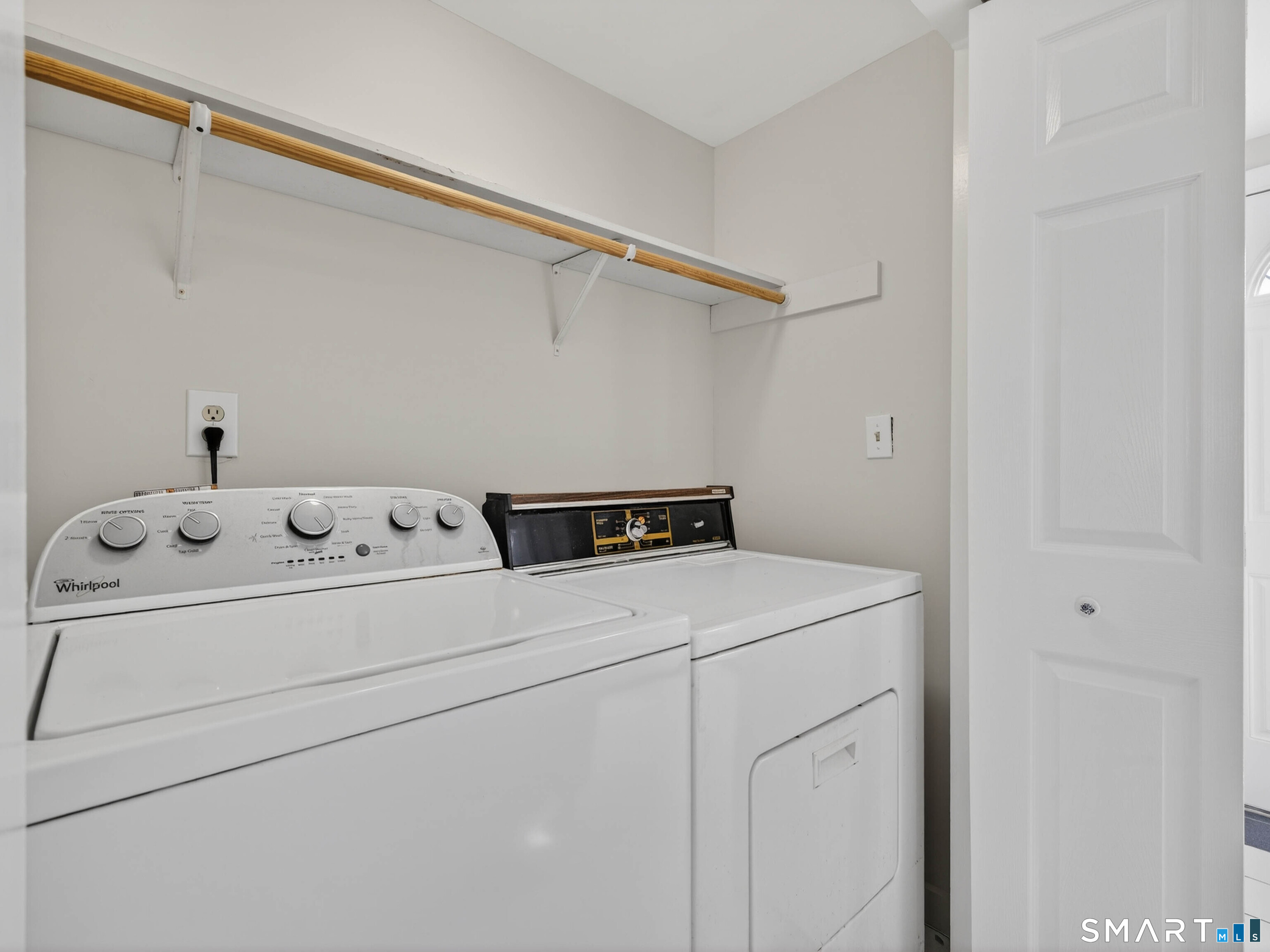 15 Buell Court Clinton, CT 06413 - Photo 17 of 29 Laundry with access to small rear deck.