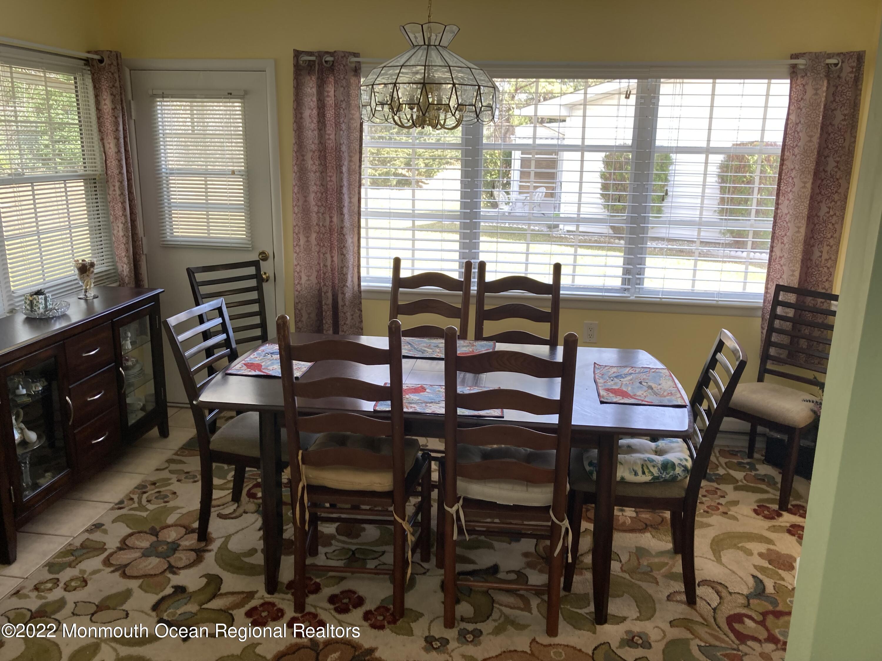 8 Masters Road Brick, NJ 08724 - Photo 5 of 11 a view of a dining room with furniture window and outside view