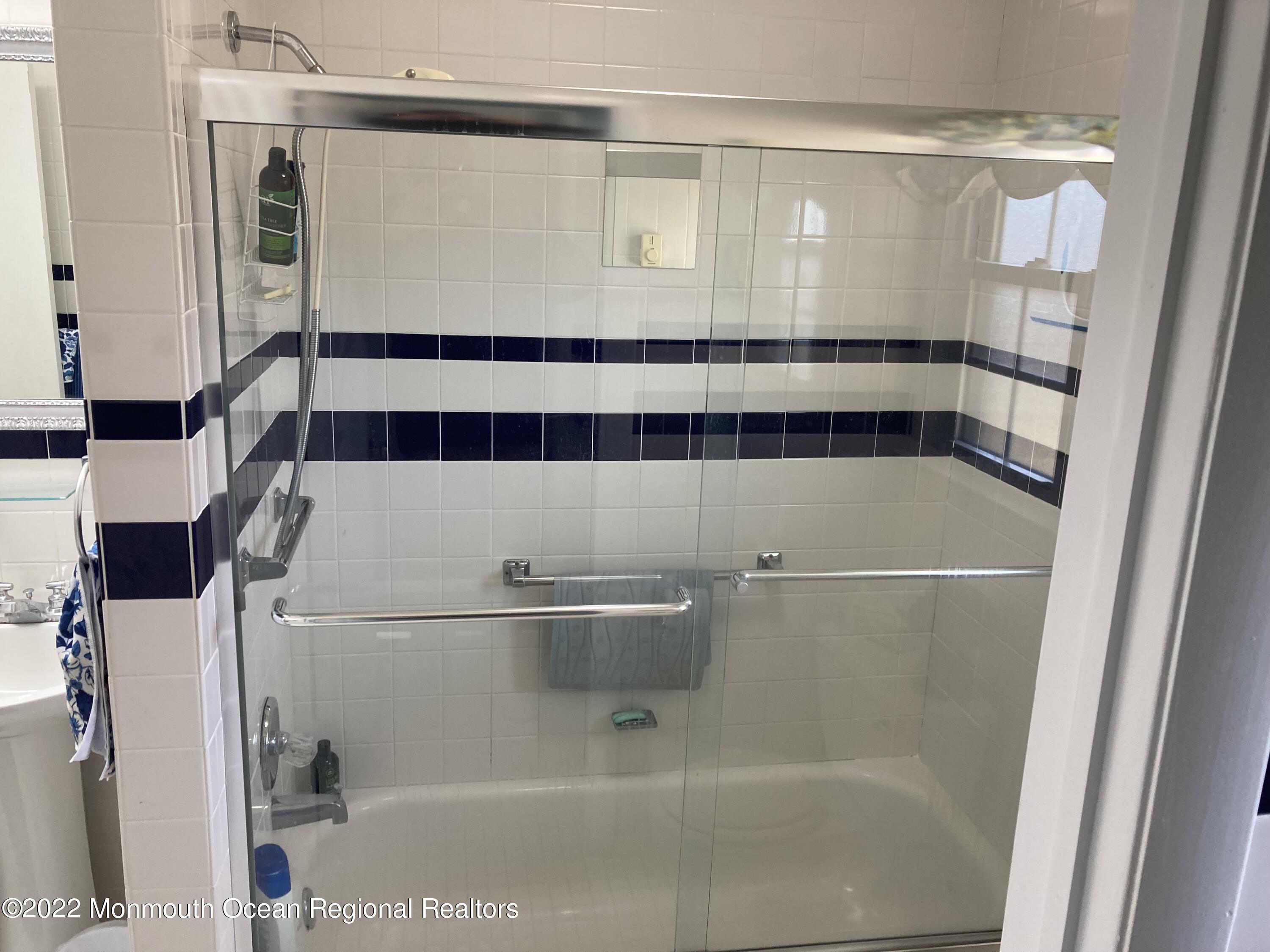 8 Masters Road Brick, NJ 08724 - Photo 8 of 11 a bathroom with a shower and a sink