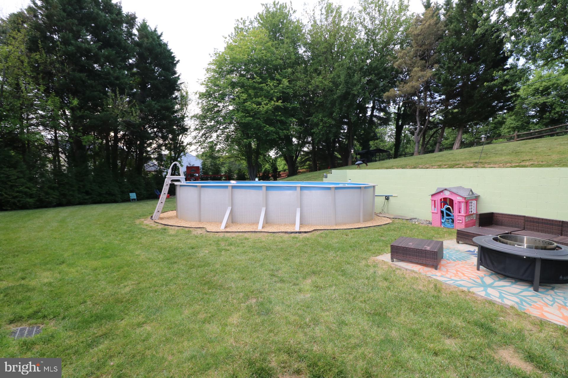 11901 Rustic Farm Court Germantown, MD 20874 - Photo 113 of 134 Sunny backyard oasis with pool.