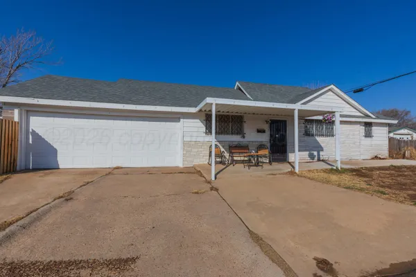 a view of a house with a patio
