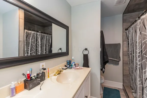 a view of a bedroom from a hallway