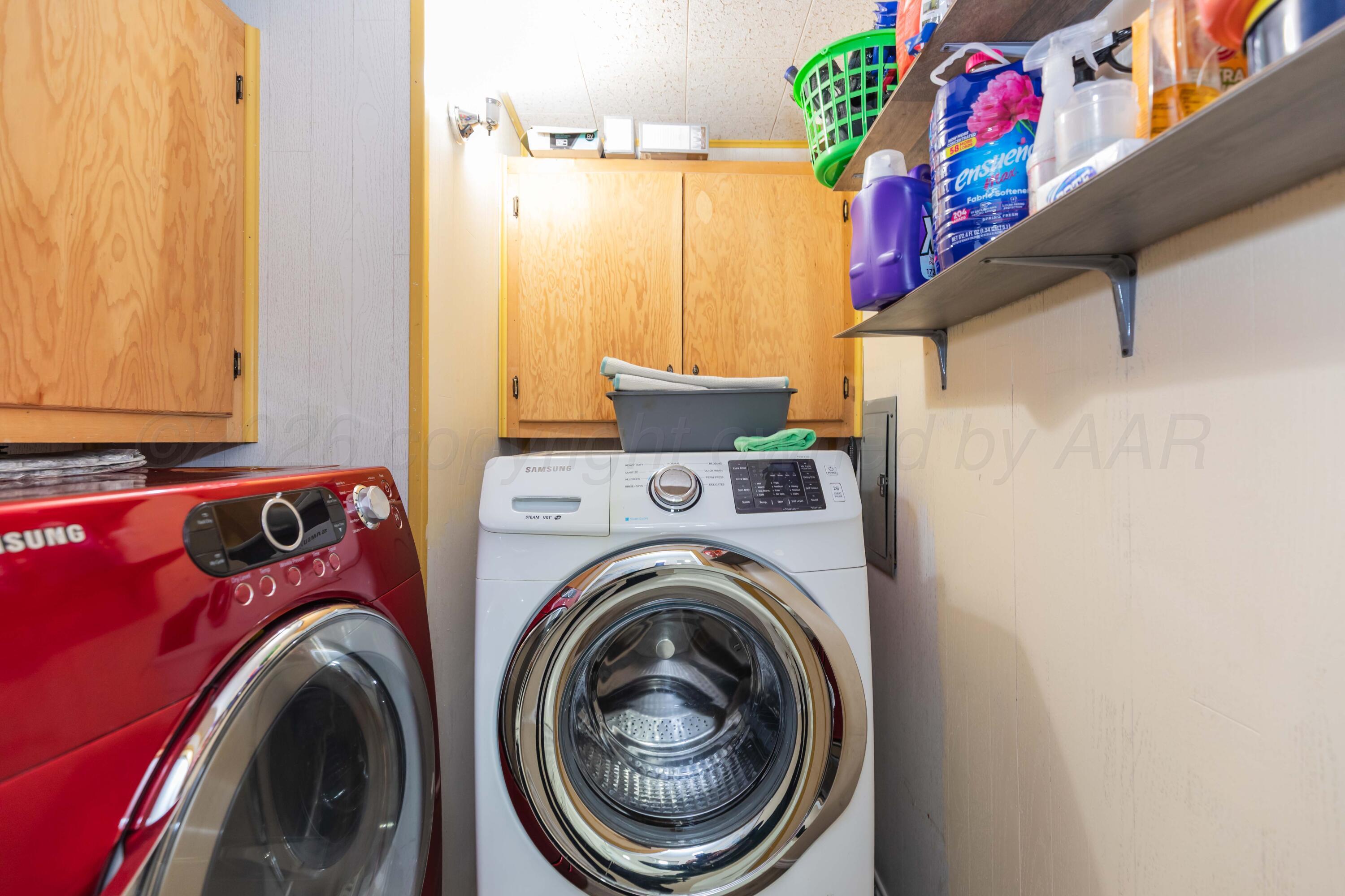 905 North Travis Street Amarillo, TX 79107 - Photo 36 of 42 a utility room with dryer and washer