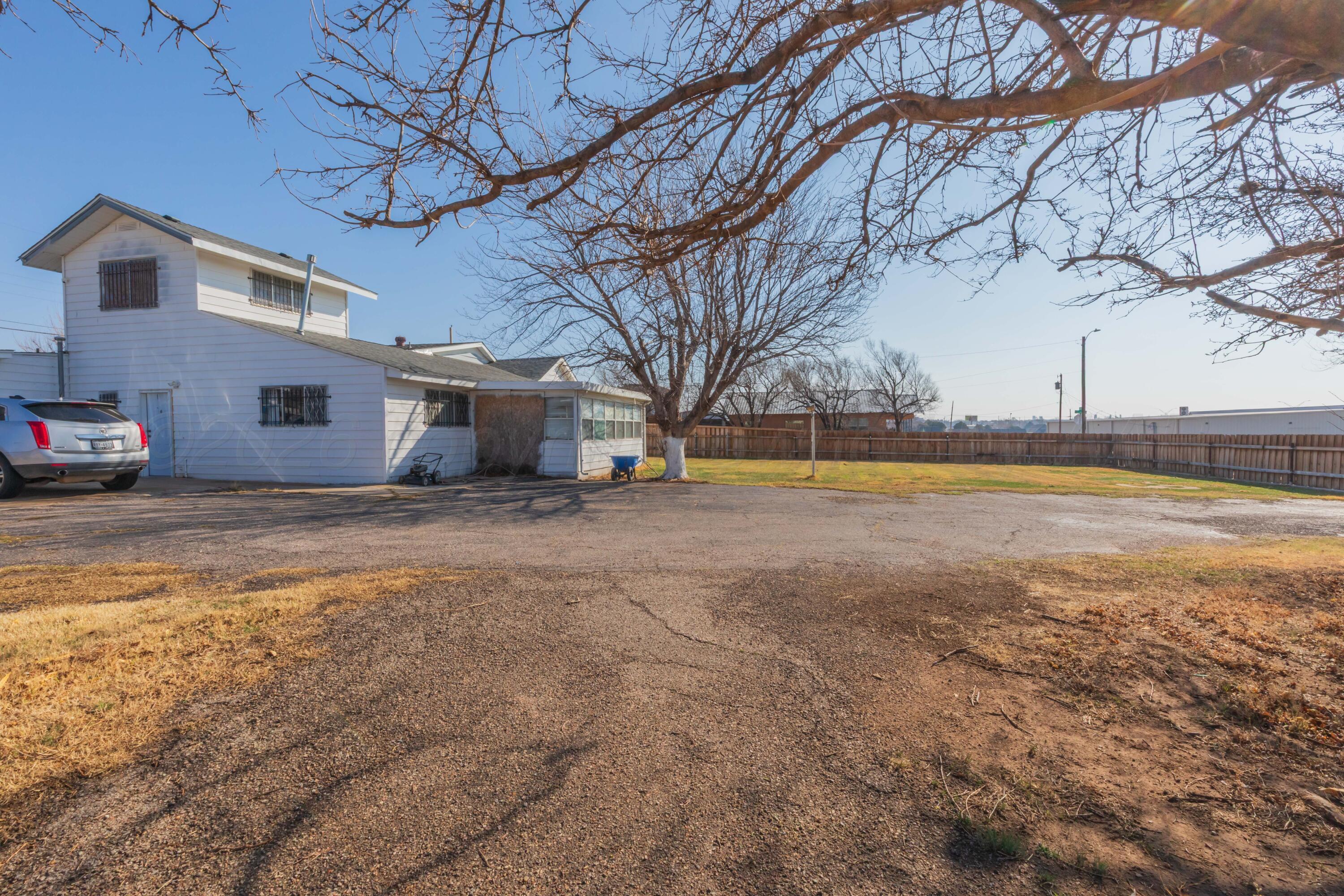 905 North Travis Street Amarillo, TX 79107 - Photo 41 of 42 a view of a house with a yard