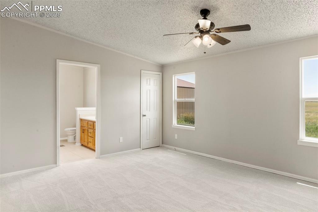 34535 Big Springs Road Yoder, CO 80864 - Photo 13 of 34 a view of an empty room with a window