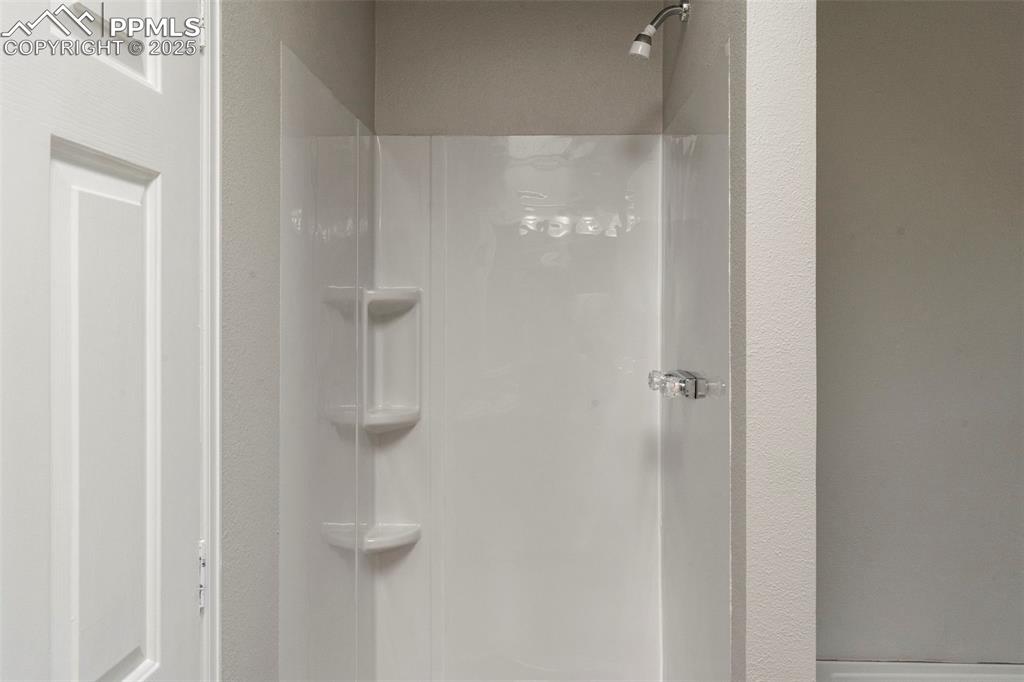 34535 Big Springs Road Yoder, CO 80864 - Photo 16 of 34 a bathroom with a shower