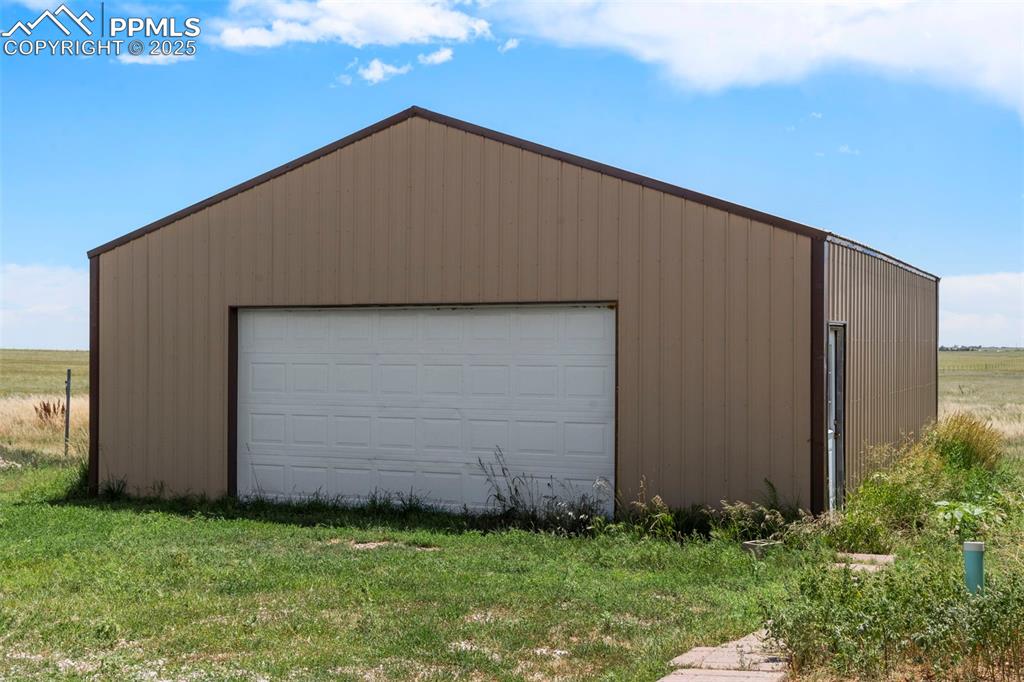 34535 Big Springs Road Yoder, CO 80864 - Photo 27 of 34 a backyard of a house