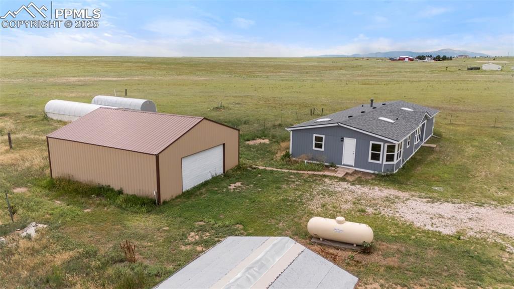 34535 Big Springs Road Yoder, CO 80864 - Photo 29 of 34 a view of a house with a ocean view