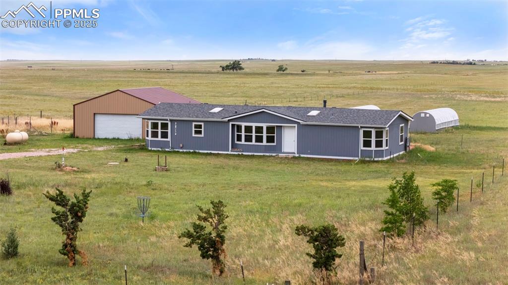 34535 Big Springs Road Yoder, CO 80864 - Photo 3 of 34 a view of an ocean with a building in the background