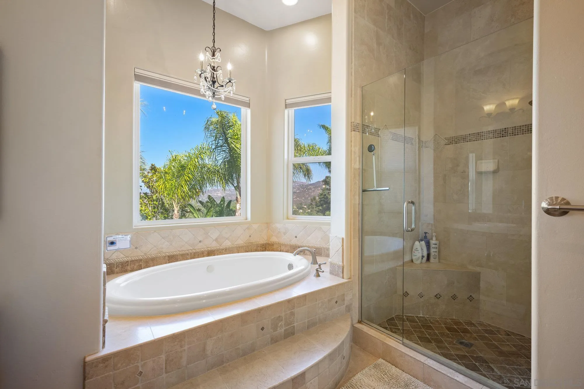 16110 Lakeview Road Poway, CA 92064 - Photo 23 of 51 a bathroom with a bathtub and a shower