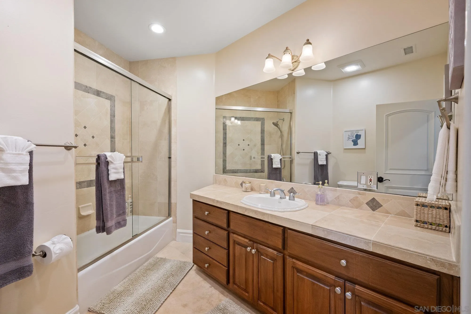 16110 Lakeview Road Poway, CA 92064 - Photo 33 of 51 a spacious bathroom with a double vanity sink mirror and double