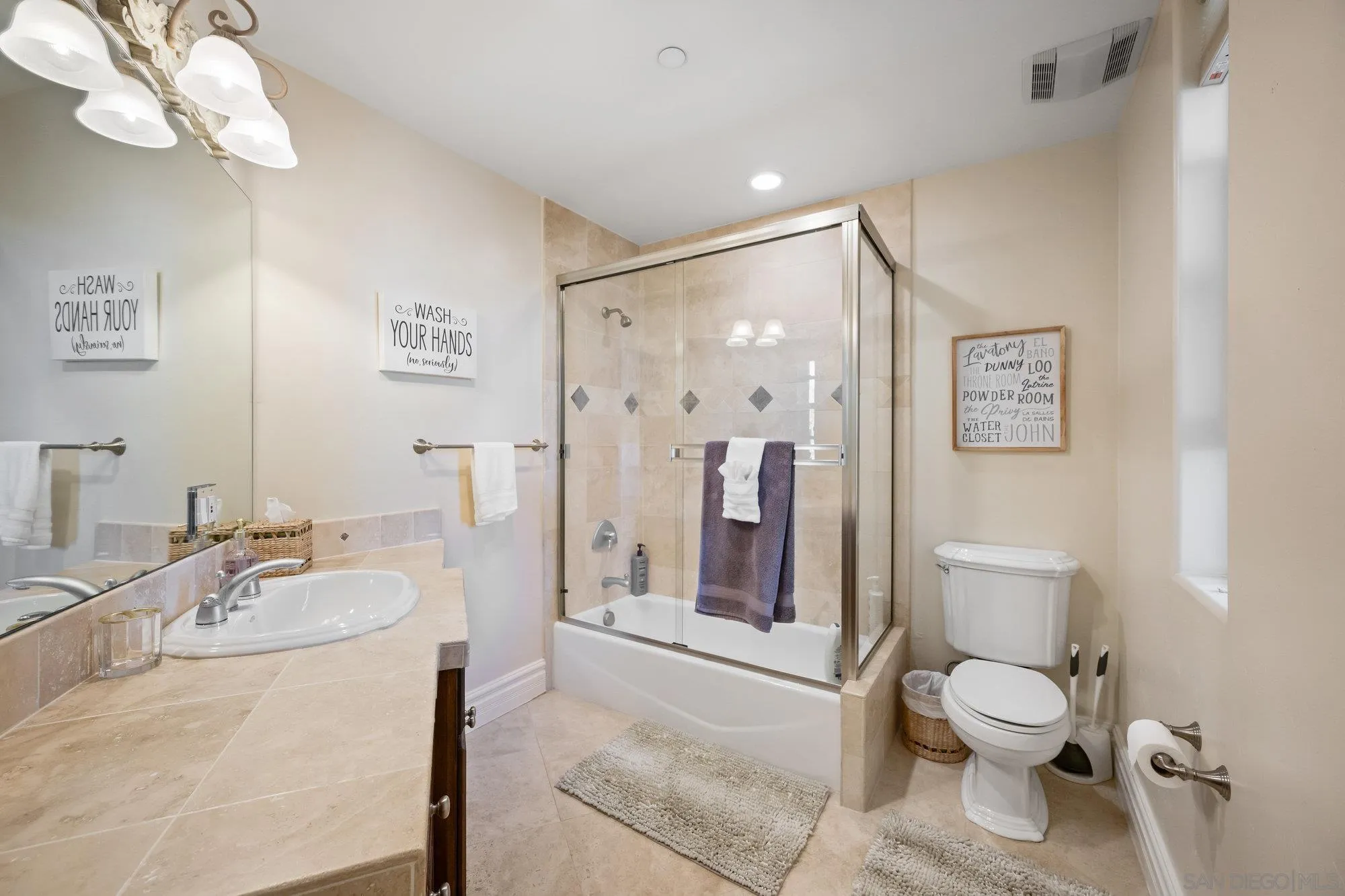 16110 Lakeview Road Poway, CA 92064 - Photo 35 of 51 a bathroom with a sink a toilet and shower