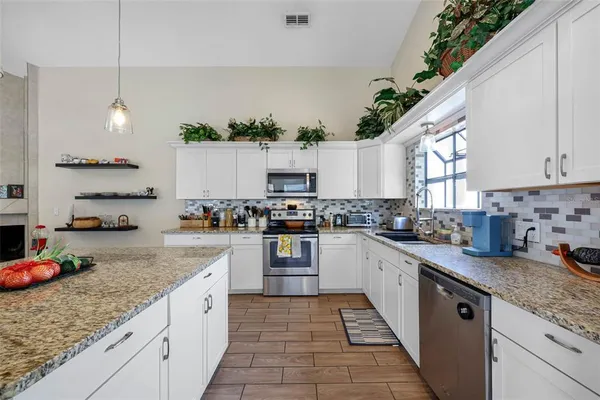 $574,900 | 413 Manor Boulevard, Palm Harbor, FL 34683