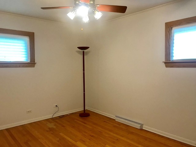 10631 Austin Avenue Chicago Ridge, IL 60415 - Photo 14 of 24 a view of an empty room with a window