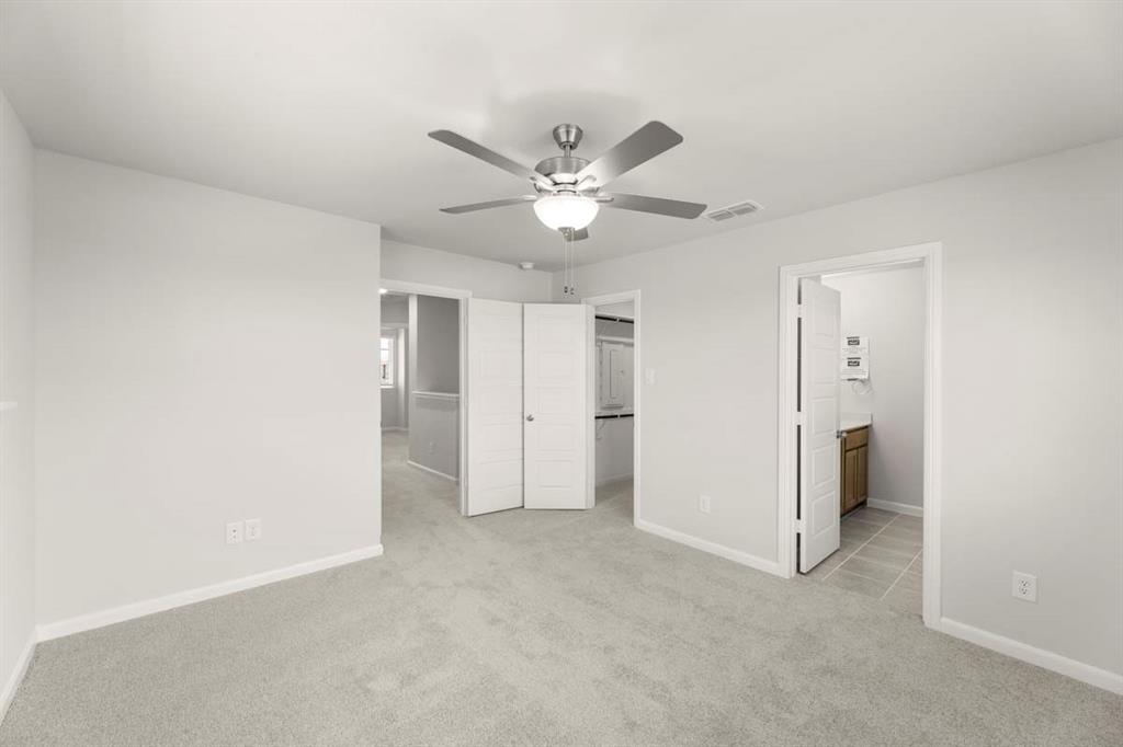 451 Sweet Spring Drive Lavon, TX 75166 - Photo 13 of 33 13-451-sweet-spring-lavon-tx-primary-bedroom