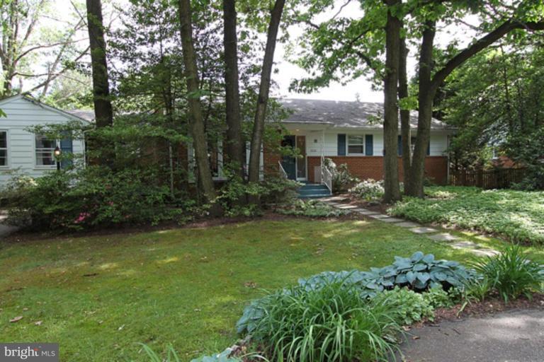 10732 Kinloch Road Silver Spring, MD 20903 - Photo 1 of 1 a view of a house with a yard and sitting area