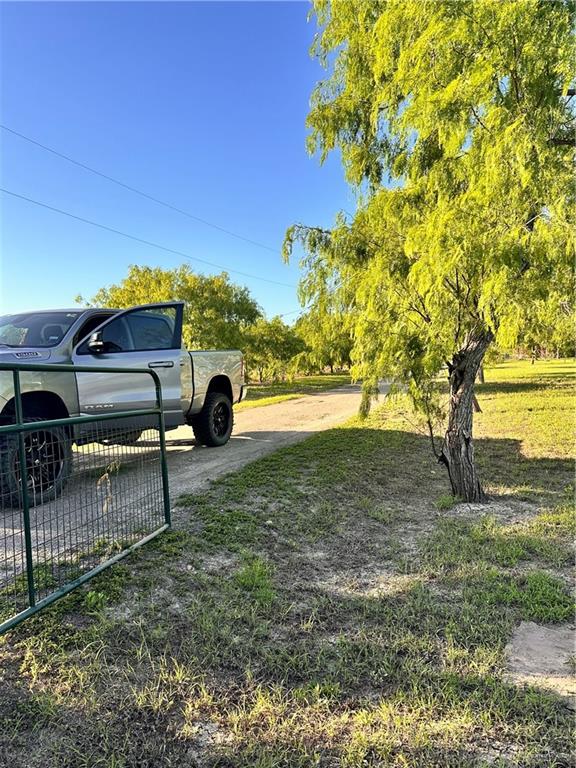 26841 Iowa Gardens Road San Benito, TX 78586 - Photo 10 of 10 View of yard with fence