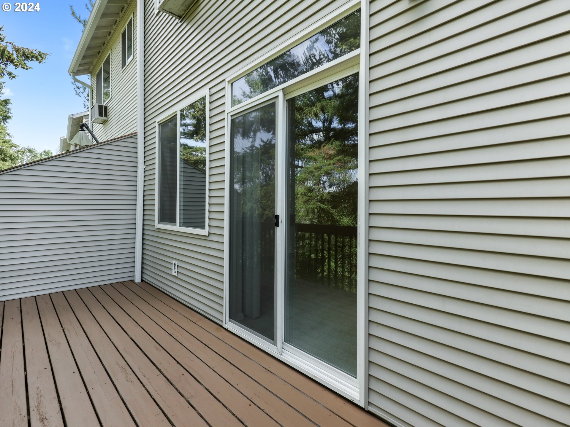 14315 Southwest Cougar Ridge Drive Beaverton, OR 97008 - Photo 5 of 21 a view of a room with wooden floor
