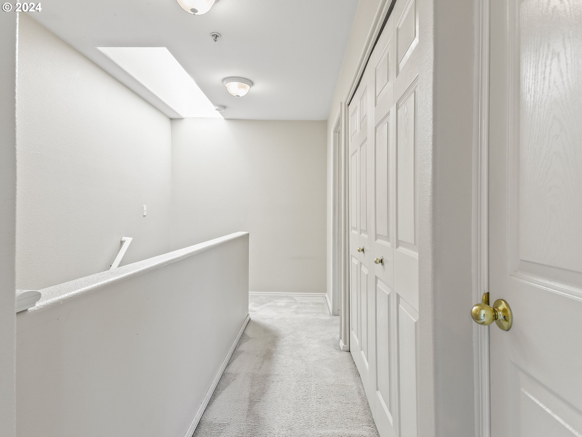 14315 Southwest Cougar Ridge Drive Beaverton, OR 97008 - Photo 9 of 21 a view of a hallway with closet