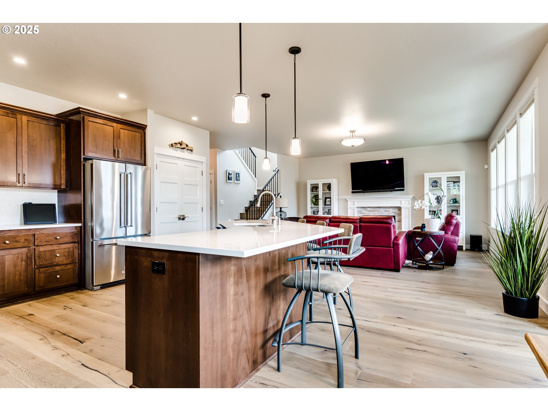 1489 Taylor Street Eugene, OR 97402 - Photo 17 of 47 a view of kitchen with stainless steel appliances kitchen island granite countertop a table chairs and a wooden floor