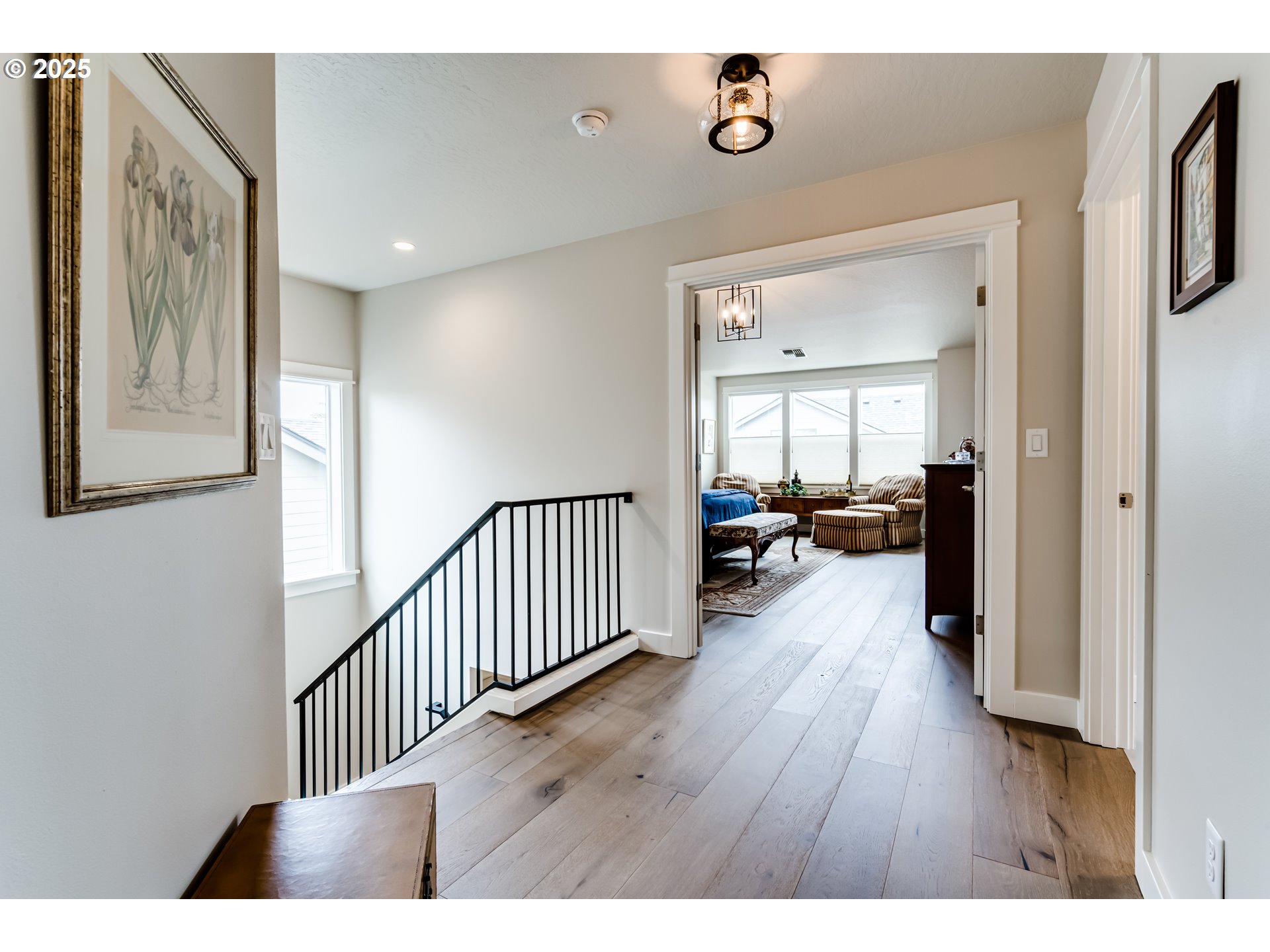 1489 Taylor Street Eugene, OR 97402 - Photo 24 of 47 a view of a hallway view with living room with wooden floor