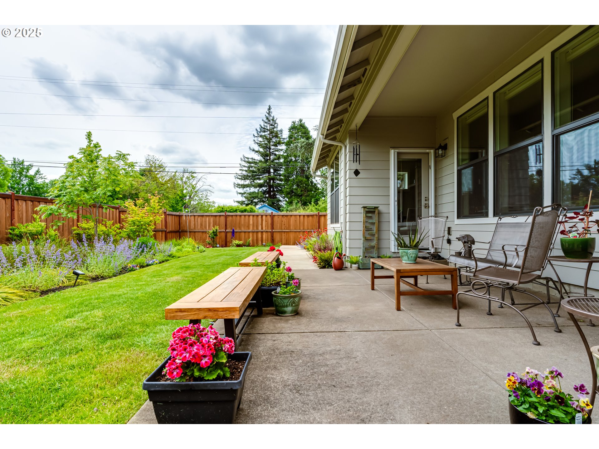 1489 Taylor Street Eugene, OR 97402 - Photo 45 of 47 a view of a backyard with sitting area and furniture