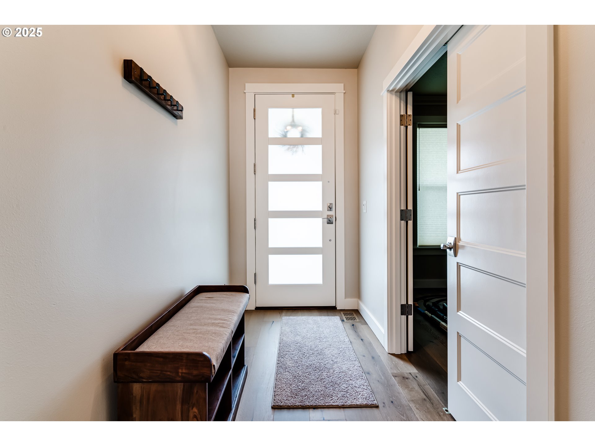 1489 Taylor Street Eugene, OR 97402 - Photo 6 of 47 a view of a room with wooden floor and windows