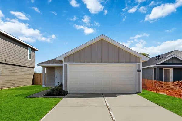 a front view of house with yard