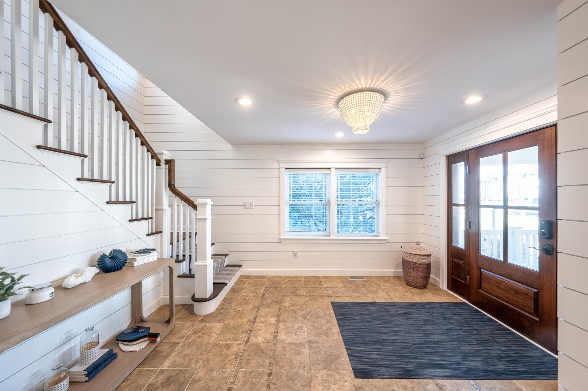 40 13th Street East Avalon, NJ 08202 - Photo 13 of 40 a view of entryway with wooden floor and windows