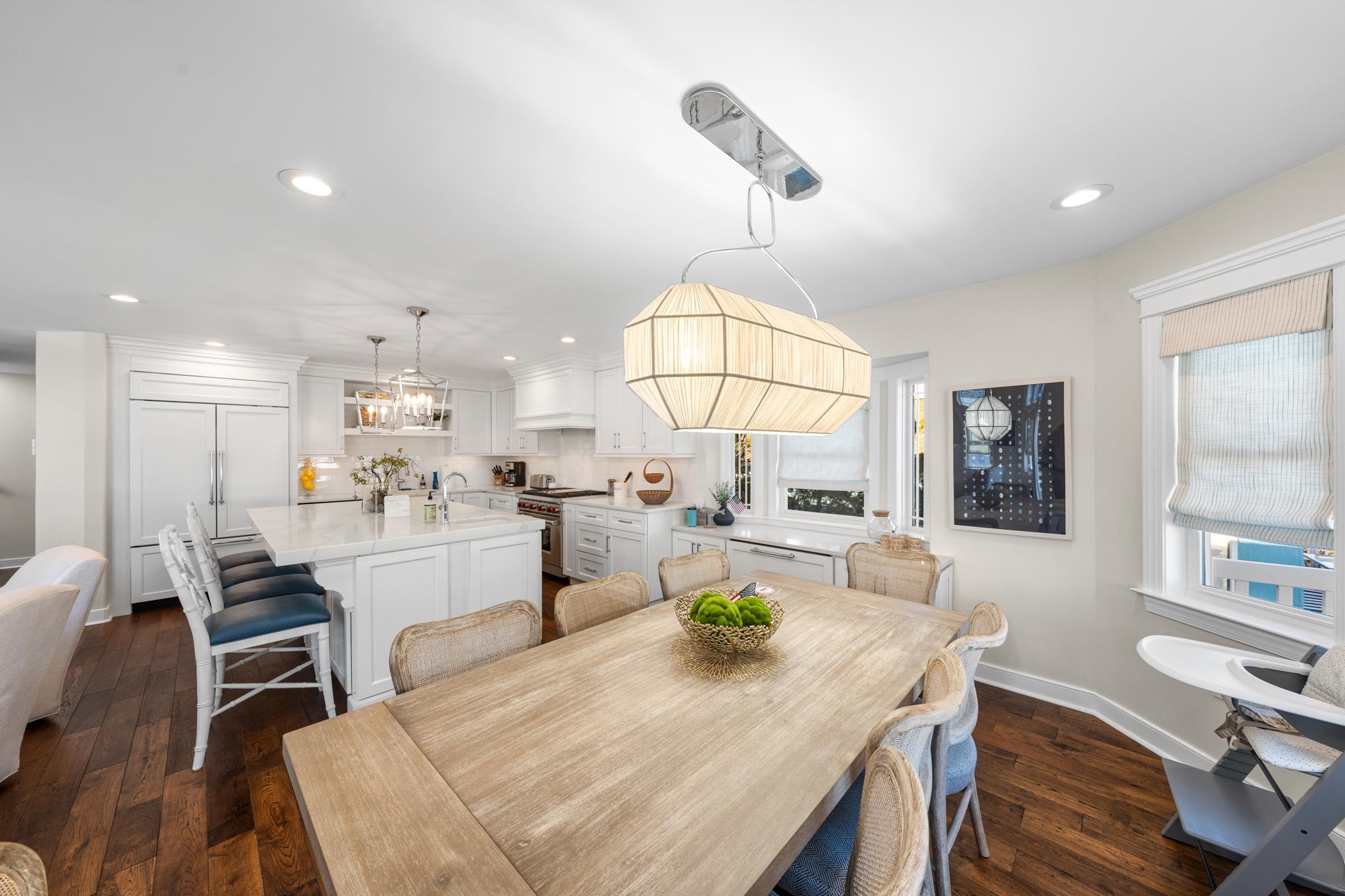 40 13th Street East Avalon, NJ 08202 - Photo 17 of 40 a kitchen with a dining table chairs and window