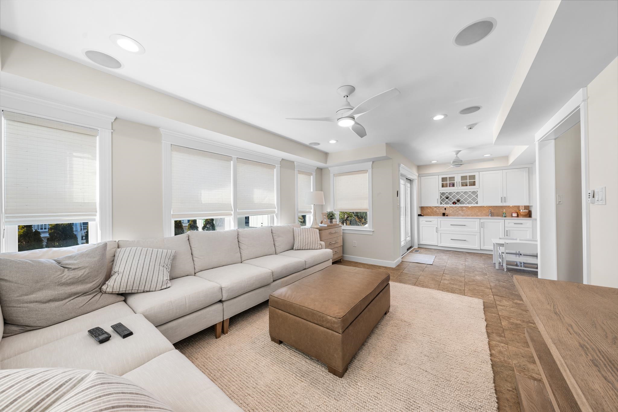 40 13th Street East Avalon, NJ 08202 - Photo 25 of 40 a living room with furniture white walls and white walls