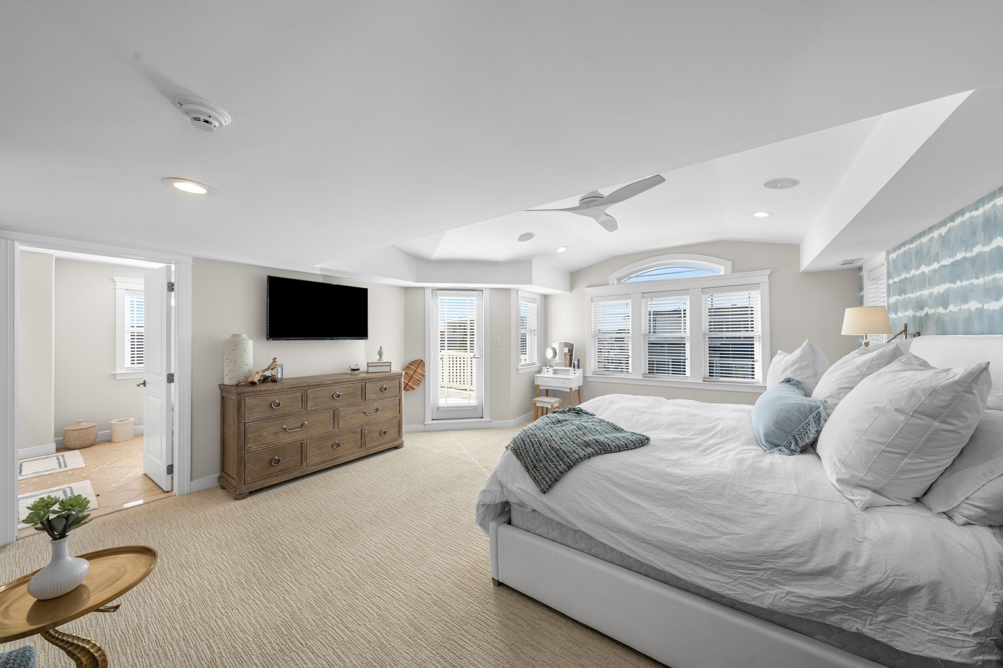 40 13th Street East Avalon, NJ 08202 - Photo 28 of 40 a bedroom with a bed and a flat screen tv