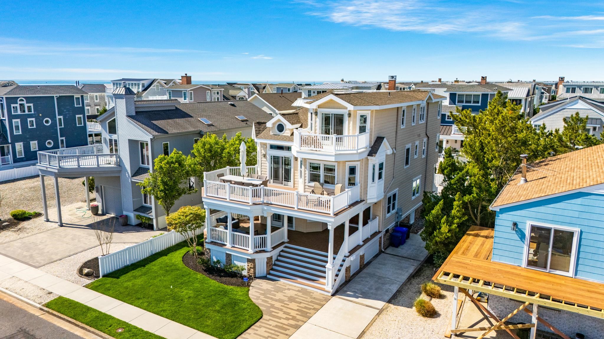 40 13th Street East Avalon, NJ 08202 - Photo 3 of 40 a aerial view of a house with a yard