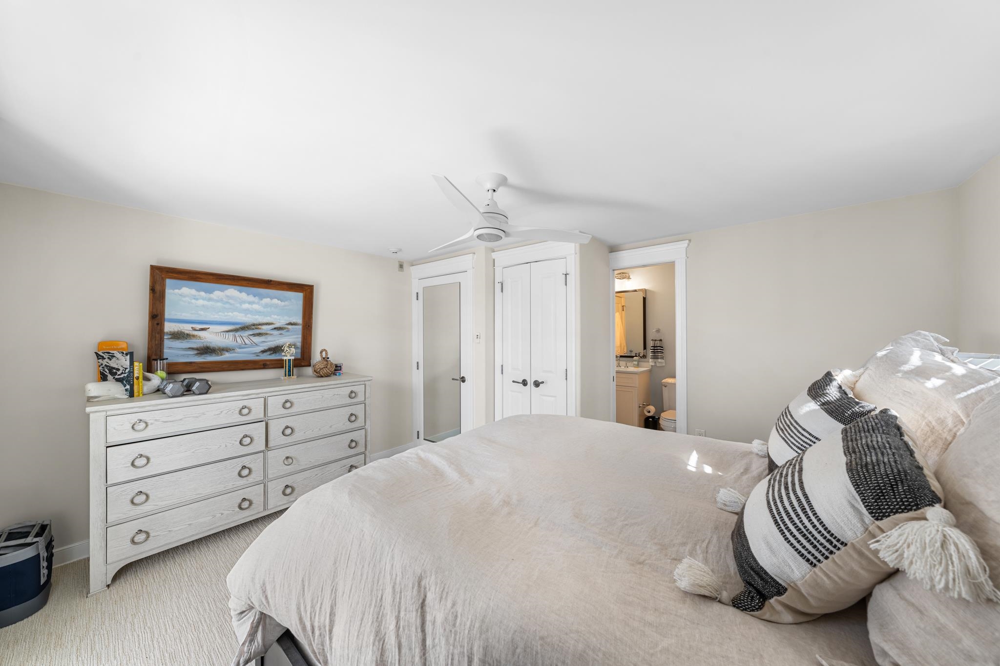 40 13th Street East Avalon, NJ 08202 - Photo 37 of 40 a bedroom with a bed and a television