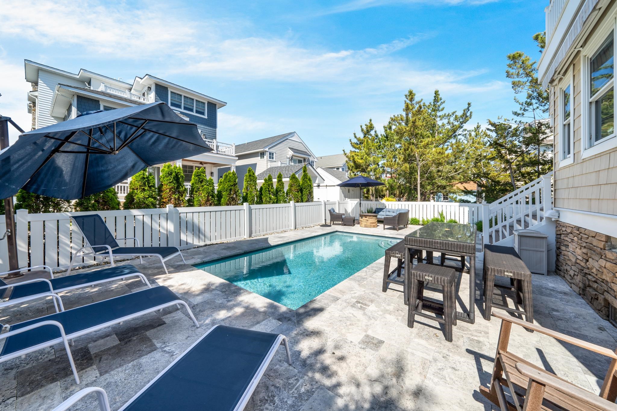 40 13th Street East Avalon, NJ 08202 - Photo 9 of 40 a view of a backyard with sitting area