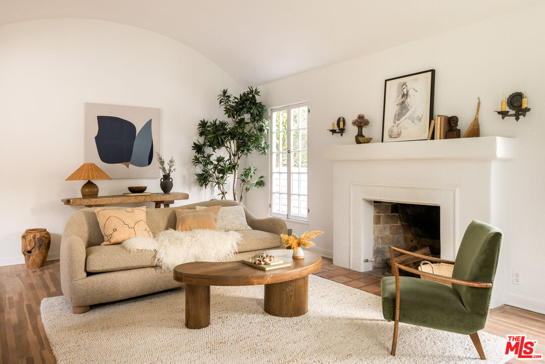 1200 Avenue 64 Pasadena, CA 91105 - Photo 11 of 62 a living room with furniture and a fireplace
