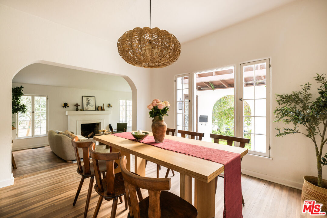 1200 Avenue 64 Pasadena, CA 91105 - Photo 14 of 62 a view of a dining room with furniture window and wooden floor