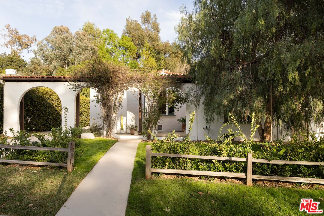 1200 Avenue 64 Pasadena, CA 91105 - Photo 2 of 62 a view of a garden with large trees