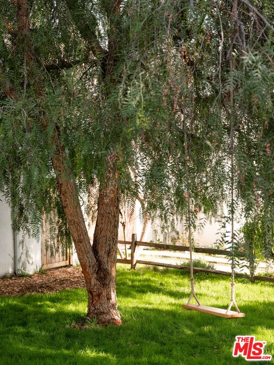 1200 Avenue 64 Pasadena, CA 91105 - Photo 3 of 62 a view of swimming pool with a tree