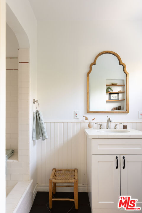 1200 Avenue 64 Pasadena, CA 91105 - Photo 32 of 62 a bathroom with a sink and a mirror