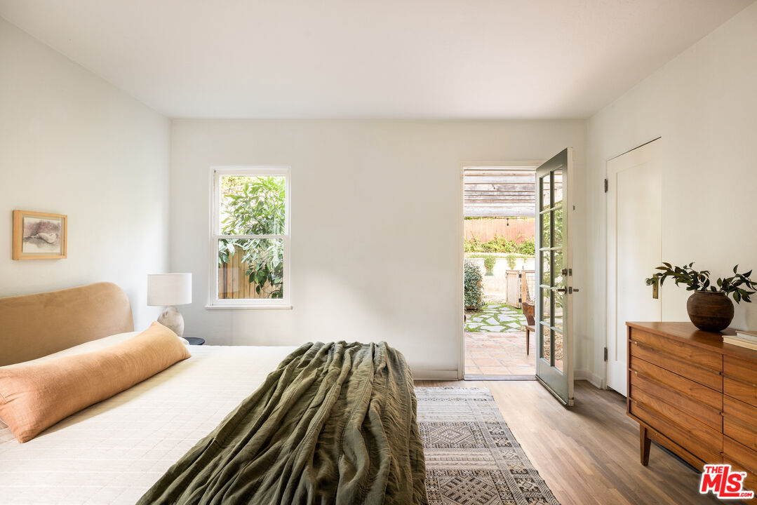 1200 Avenue 64 Pasadena, CA 91105 - Photo 34 of 62 a bedroom with a bed and a couch