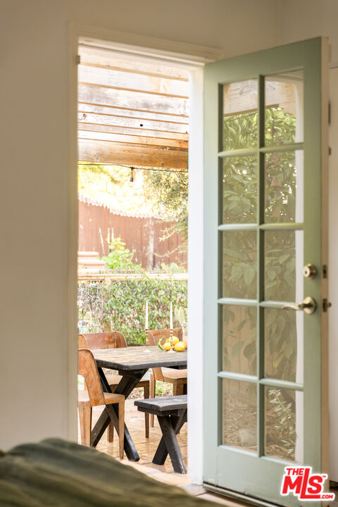 1200 Avenue 64 Pasadena, CA 91105 - Photo 35 of 62 a view of a floor to ceiling window and dining room
