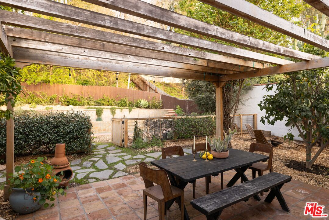 1200 Avenue 64 Pasadena, CA 91105 - Photo 36 of 62 a view of a tables and chairs in patio