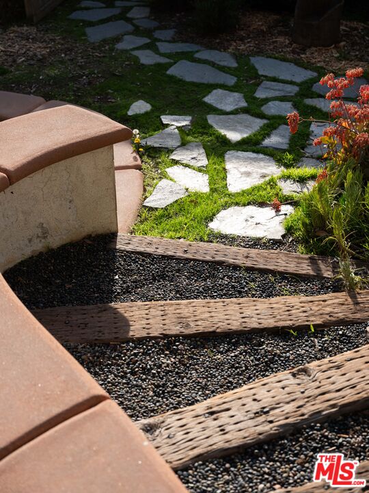 1200 Avenue 64 Pasadena, CA 91105 - Photo 44 of 62 a view of a pathway with a yard