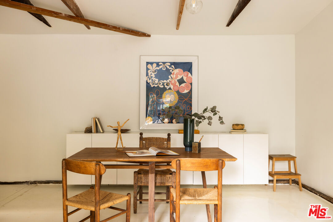 1200 Avenue 64 Pasadena, CA 91105 - Photo 53 of 62 a view of a dining room with furniture and wooden floor
