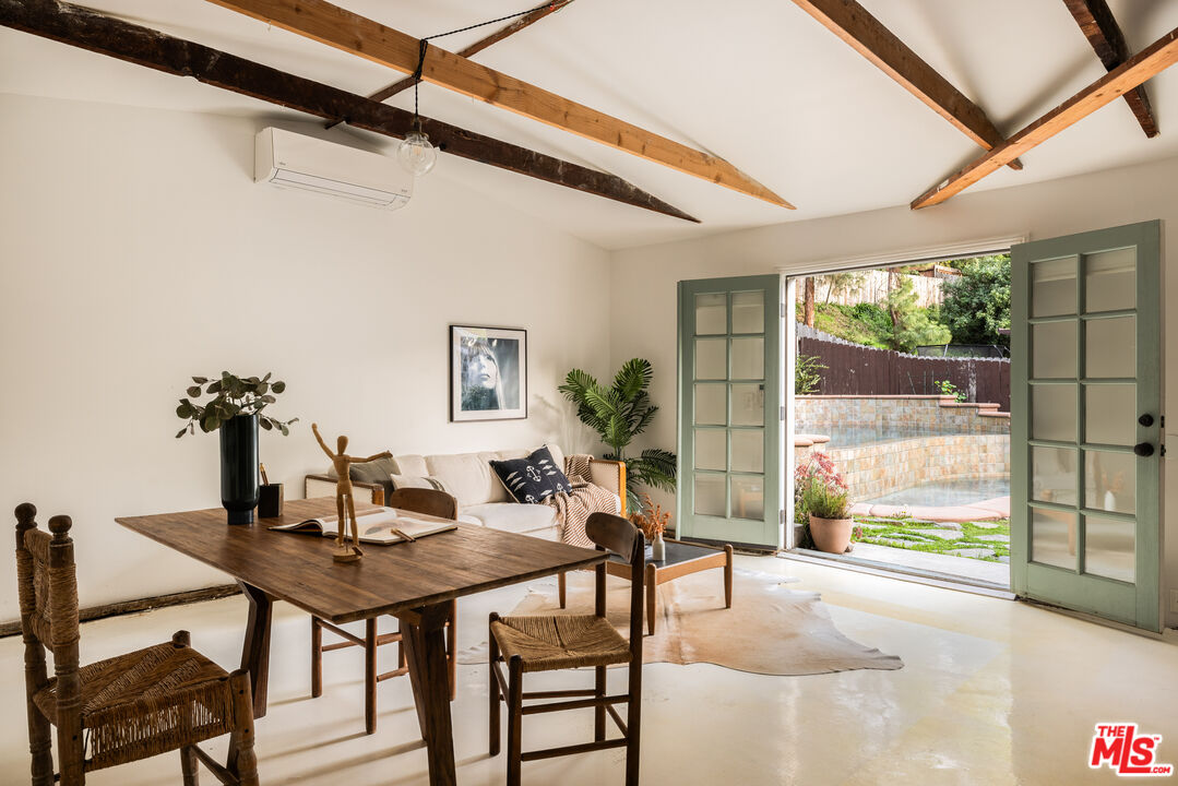 1200 Avenue 64 Pasadena, CA 91105 - Photo 54 of 62 a view of a dining room with furniture window and outside view