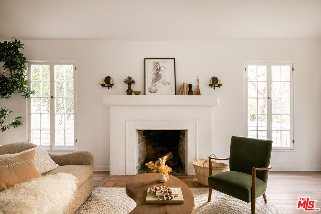 1200 Avenue 64 Pasadena, CA 91105 - Photo 10 of 62 a living room with furniture and a fireplace