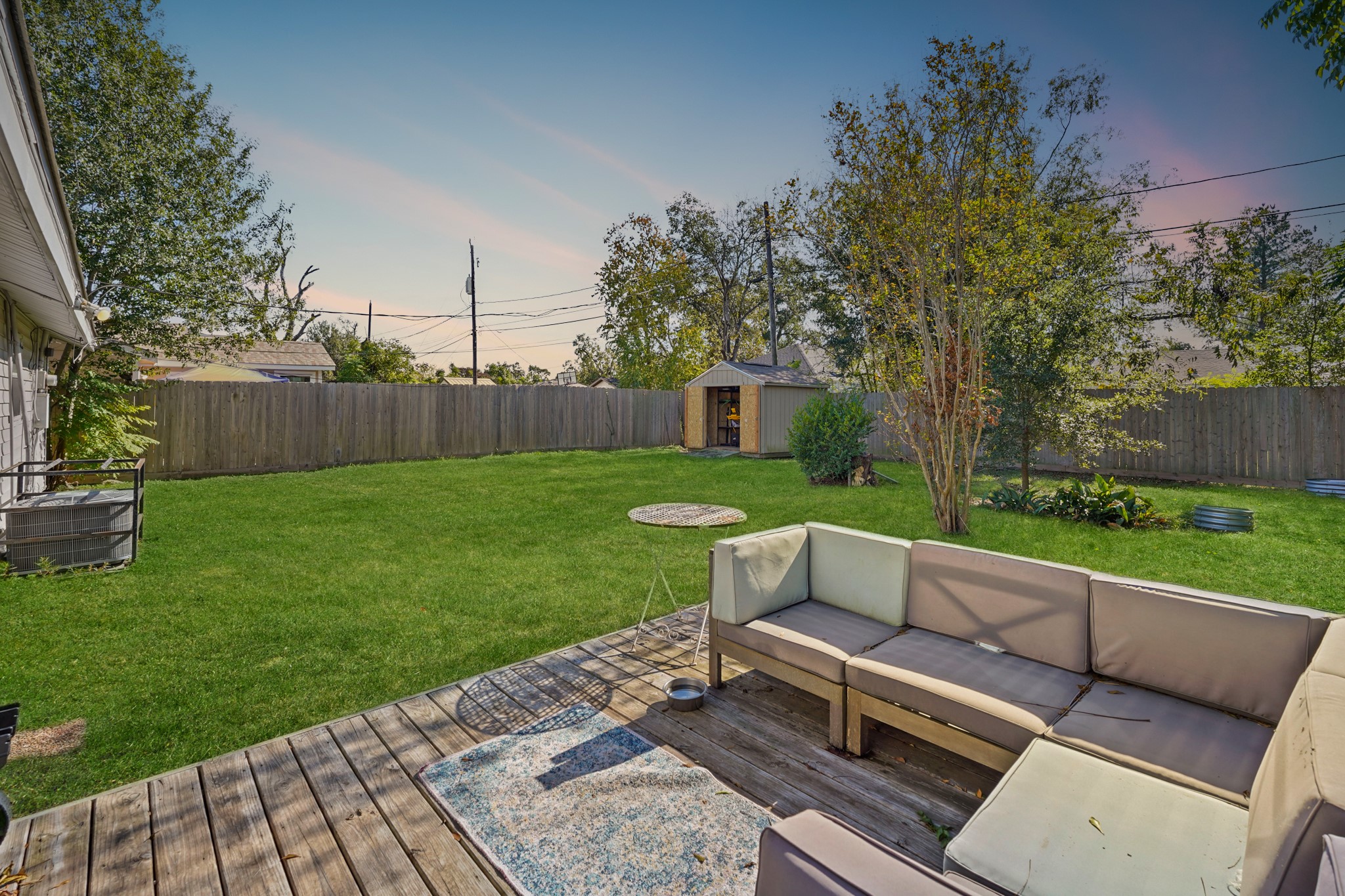 5110 Perry Street Houston, TX 77021 - Photo 13 of 15 a view of a yard with furniture and wooden fence