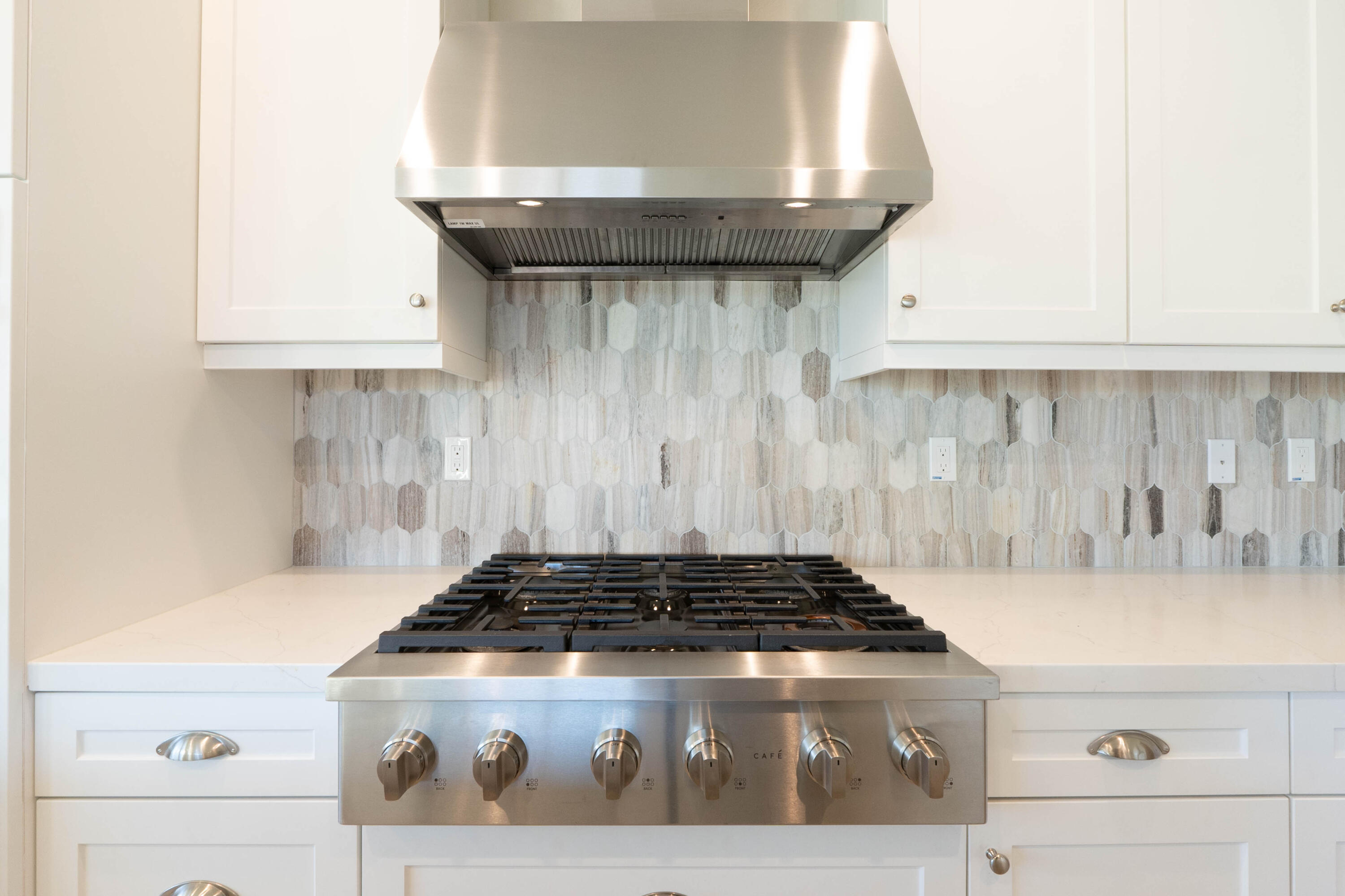 51502 Mastic Way Indio, CA 92201 - Photo 12 of 29 a stove top oven sitting inside of a kitchen